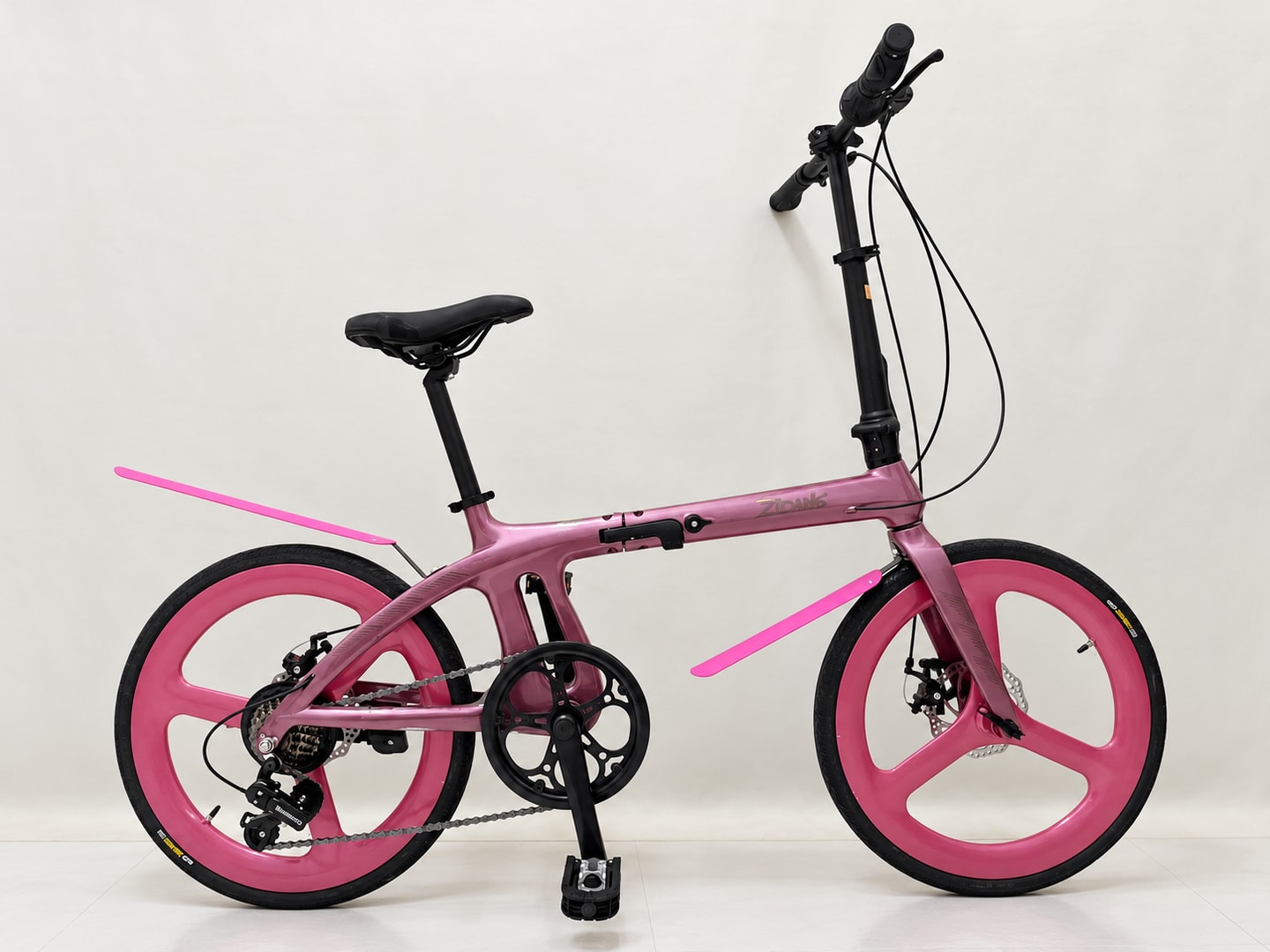 Pink folding bicycle